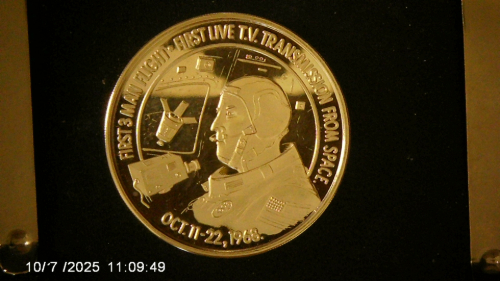 Silver-Round-With-An-Apollo-16-Motif--Design.